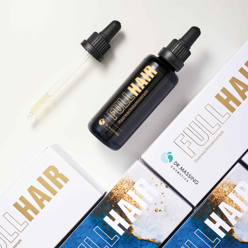 Detailansicht Dr. Massing FullHair Haarserum mit goldener und blauer Verpackung